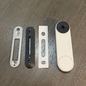 White and Black Google Video Doorbell with Mounting Plates